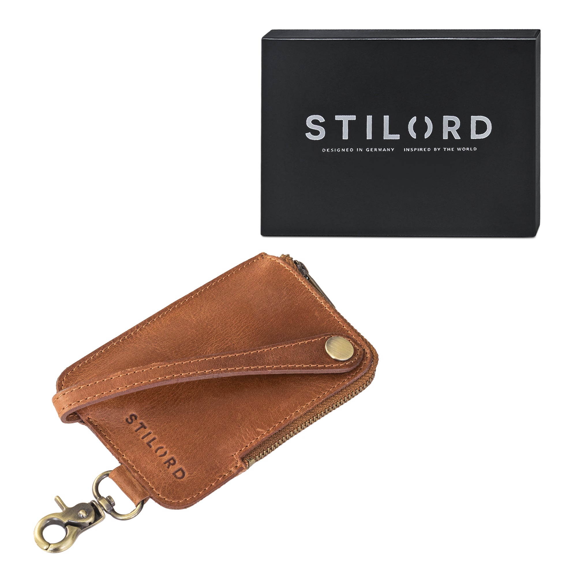 Keyholder Leder braun mit Reißverschluss und Karabiner neben einer Geschenkbox
